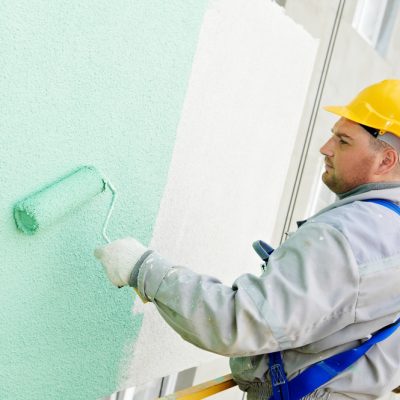builder facade painter at work